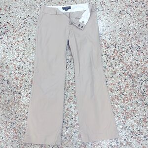 Color khaki, low cut, really nice stitching. Converts day to night seamlessly .